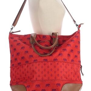 Stella & Dot "Getaway" bag & makeup pouch with a red & purple elephant print.